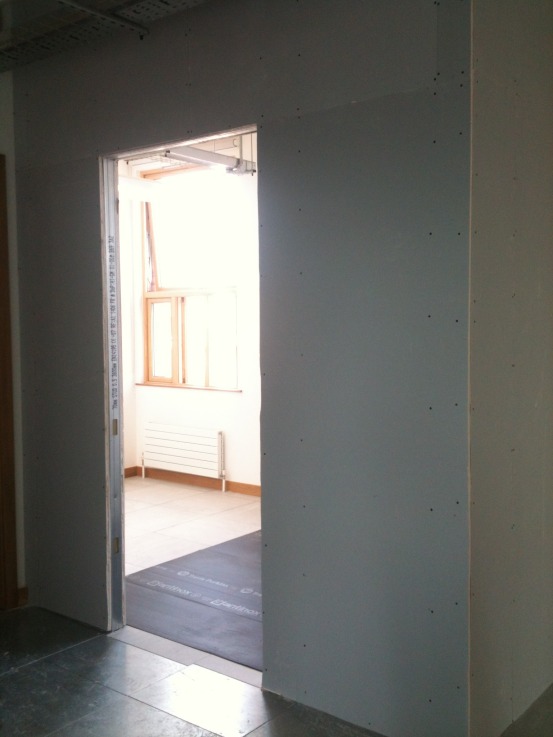 The shell of the designated comms room beginning to take shape