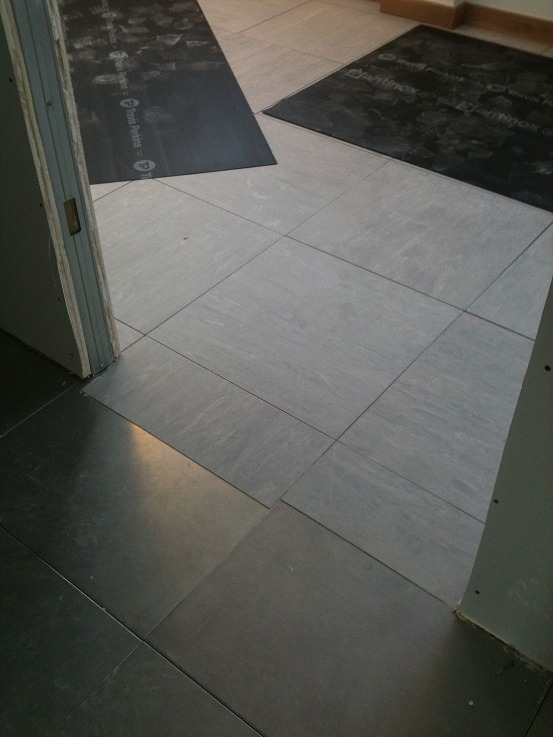 Anti-static floor tile coverings going down